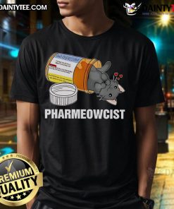 Alt Text: Cute black cat in pharmacist attire on a t-shirt, perfect for cat lovers and pharmacy enthusiasts.