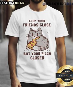 Alt Text: Cute cat graphic on a t-shirt with the phrase Keep Your Friends Close But Your Pizza Closer in bold letters.