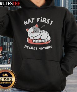 Cute cat napping in a cozy hoodie with 'First Regret Nothing' printed, perfect for cat lovers and comfy fashion enthusiasts.