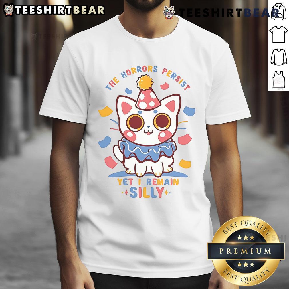 Cute Cat The Horrors Persist Yet I Remain Silly T Shirt Cute cat graphic on 'The Horrors Persist Yet I Remain' silly t-shirt, perfect for cat lovers and humor enthusiasts.