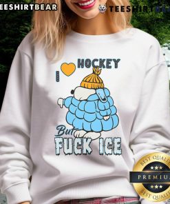 Alt Text: Cute ivory Snoopy sweatshirt with 'I Love Hockey' design, perfect for hockey fans and cozy casual wear.