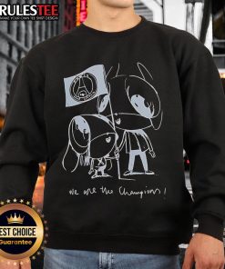 Cute Luis Enrique wearing a 'We Are The Champions' PSG sweatshirt, showcasing team pride for Paris Saint-Germain.