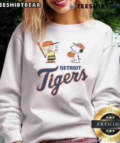 Cute Peanuts Charlie Brown and Snoopy sweatshirt featuring Detroit Tigers design, perfect for fans and cozy wear.