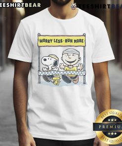 Alt Text: Cute Peanuts Worry Less Run More T-Shirt featuring playful cartoon characters promoting a positive, active lifestyle.