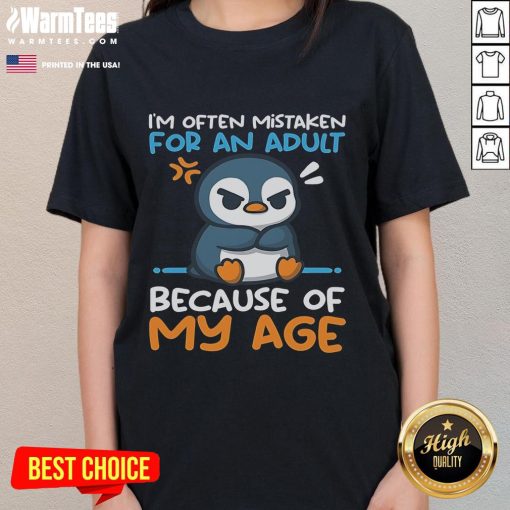 Adorable penguin design on a ladies tee, often mistaken for an adult due to its charming appearance and playful vibe.