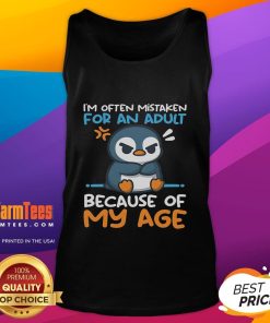 Cute penguin wearing a tank top, often mistaken for an adult because of my age, showcasing playful personality and charm.