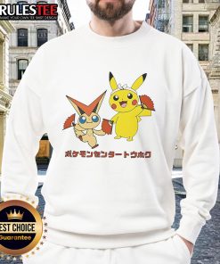 Alt Text: Cute Pokemon Victini and Pikachu monster sweatshirt featuring vibrant colors and playful design for fans.