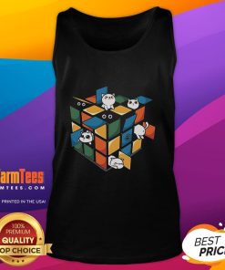 Adorable kittens playing with a Rubik's Cube on a tank top featuring colorful cat designs for cat lovers.