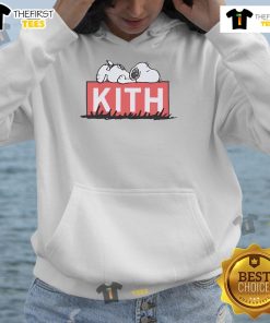Cute Snoopy sleeping in a cozy Kith hoodie, perfect for fans of stylish and comfortable loungewear.