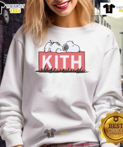 Cute Snoopy sleeping graphic on a cozy Kith sweatshirt, perfect for casual wear and Peanuts fans.