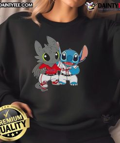Alt Text: Cute Stitch and Toothless Philadelphia Phillies sweatshirt featuring vibrant designs and cozy fabric for fans.