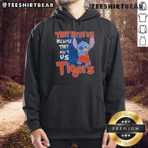 Alt Text: Cute Stitch Detroit Tigers hoodie with 'They Hate Us Because They Ain't Us' slogan, perfect for fans.