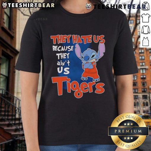 Cute Stitch Detroit Tigers ladies tee featuring 'They Hate Us Because They Ain't Us' slogan in vibrant colors.