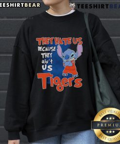 Alt Text: Cute Stitch They Hate Us Because They Ain't Us Detroit Tigers sweatshirt in vibrant blue, perfect for fans.