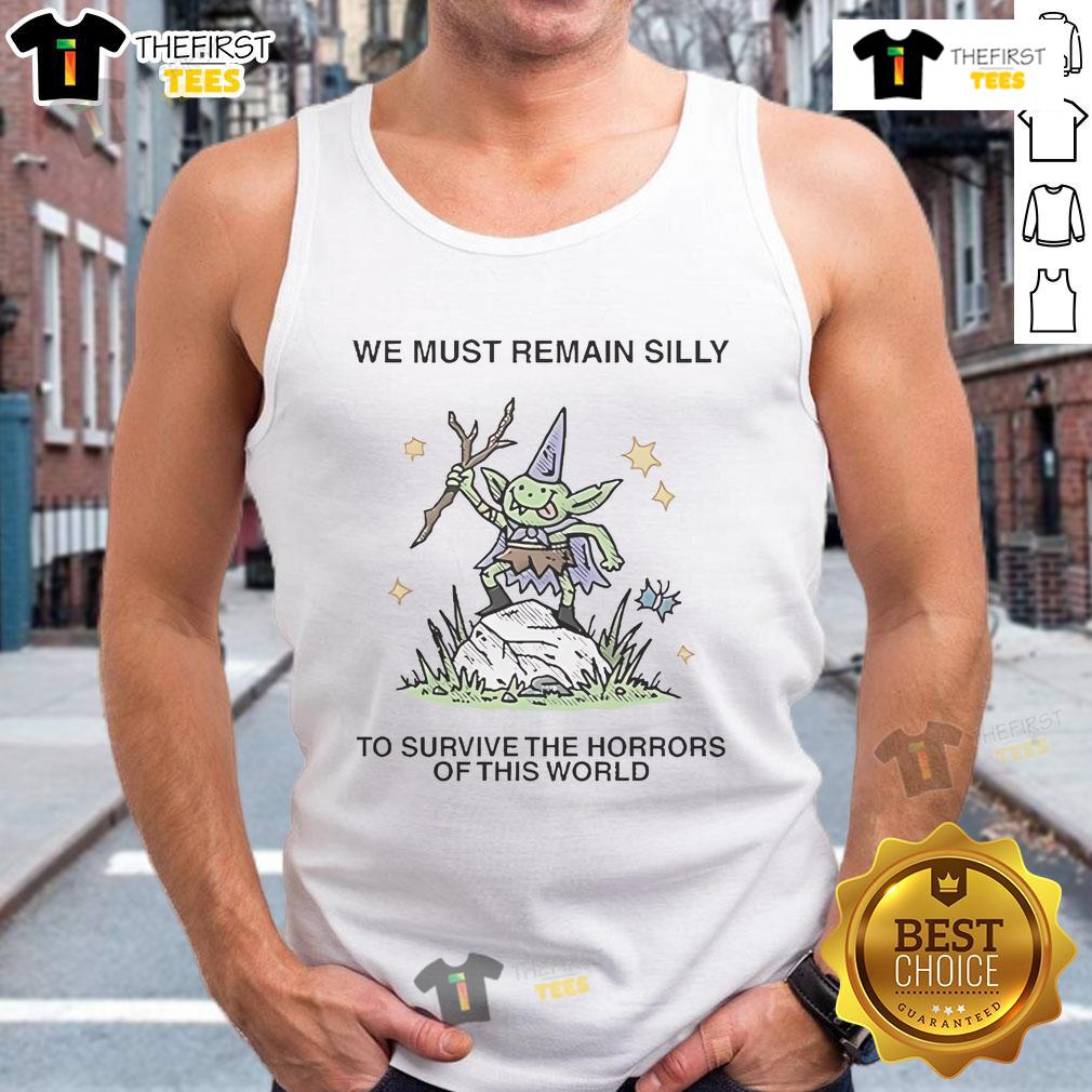 Cute We Must Remain Silly To Survive The Horrors Of This World Tank Top Alt Text: Cute tank top with 'We Must Remain Silly To Survive The Horrors Of This World' design, perfect for casual wear.