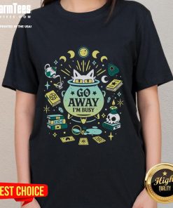 Cute witch cat at work on 'Go Away I'm Busy' ladies tee, perfect for cat lovers and Halloween enthusiasts.