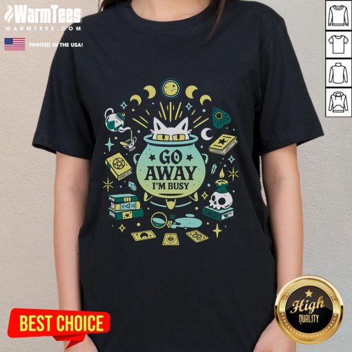 Cute witch cat at work on 'Go Away I'm Busy' ladies tee, perfect for cat lovers and Halloween enthusiasts.