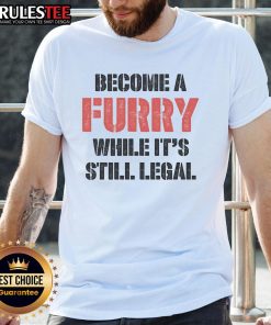 Alt Text: Funny 'Become A Furry While It's Still Legal' T-Shirt design featuring playful graphics and vibrant colors.