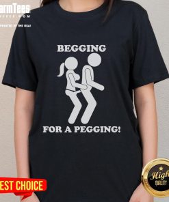 Funny 'Begging for a Pegging' ladies tee featuring playful text design, perfect for humor and unique fashion statements.