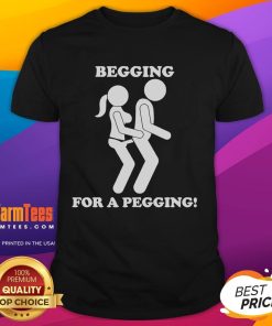 Funny Begging For A Pegging T-Shirt featuring humorous text design, perfect for playful and cheeky fashion enthusiasts.