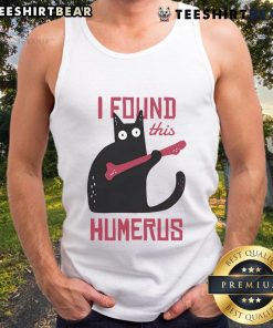 Funny cat wearing a bone tank top, showcasing its humorous side and playful personality. Perfect for cat lovers!