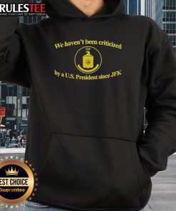 Funny CIA hoodie featuring 'We Haven't Been Criticized By A US President Since JFK' slogan, perfect for humor lovers.