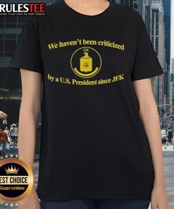 Funny CIA t-shirt depicting 'We Haven't Been Criticized By A US President Since JFK' for ladies, showcasing humor and history.