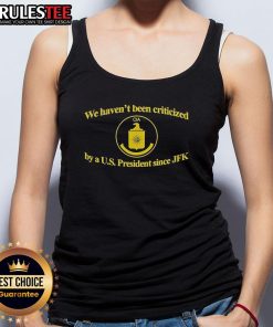 Funny CIA tank top featuring the quote about presidential criticism since JFK, perfect for humor and political apparel.