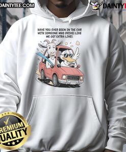 Funny goat and duck in a car wearing Extra Life hoodie, showcasing quirky animal friendship and playful driving antics.