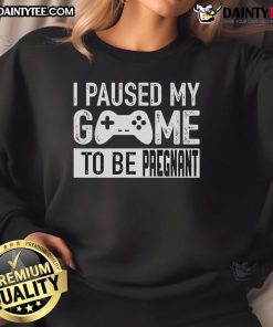 Funny I Paused My Game to Be Pregnant sweatshirt featuring humorous gaming-themed design for expectant gamers.