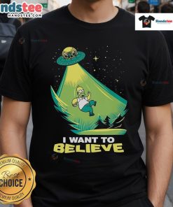 Alt Text: Funny I Want To Believe Homer Simpson UFO T-Shirt featuring iconic cartoon character and playful alien theme.