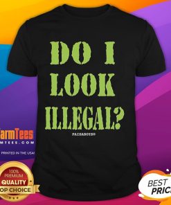 Alt Text: Funny Illegal Aliens 'Do I Look Illegal' Paisaboys T-Shirt featuring a humorous design and vibrant colors.