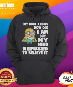 Funny Minion hoodie with the quote 'My body knows how old I am but my mind refuses to believe it' in vibrant colors.