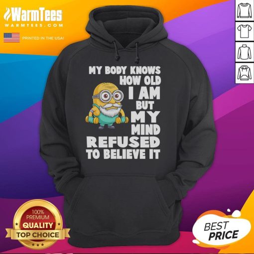 Funny Minion hoodie with the quote 'My body knows how old I am but my mind refuses to believe it' in vibrant colors.