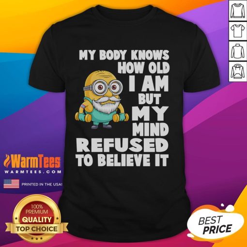 Funny Minion t-shirt with 'My Body Knows How Old I Am But My Mind Refuses To Believe It' quote in vibrant colors.
