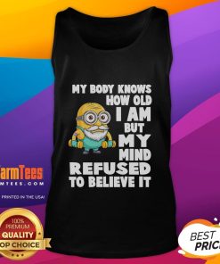 Funny Minion tank top with the quote My body knows how old I am but my mind refuses to believe it. Perfect for humor lovers.
