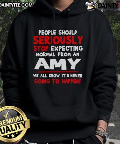 Funny people wearing 'Seriously Stop Expecting Normal' Amy hoodie, showcasing humor and individuality in casual fashion.