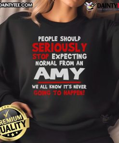 Funny people wearing 'Seriously Stop Expecting Normal' Amy sweatshirt, showcasing humor and unique fashion style.