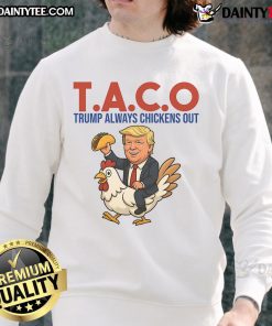 Funny Taco Trump sweatshirt featuring a cartoon of Trump hesitating to ride a chicken, capturing humorous political satire.