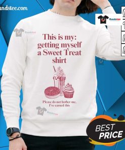Funny sweatshirt saying 'This Is My Getting Myself A Sweet Treat Shirt' perfect for relaxing and enjoying treats.