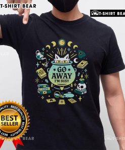 Funny witch cat at work graphic tee with Go Away I'm Busy text, perfect for cat lovers and Halloween enthusiasts.