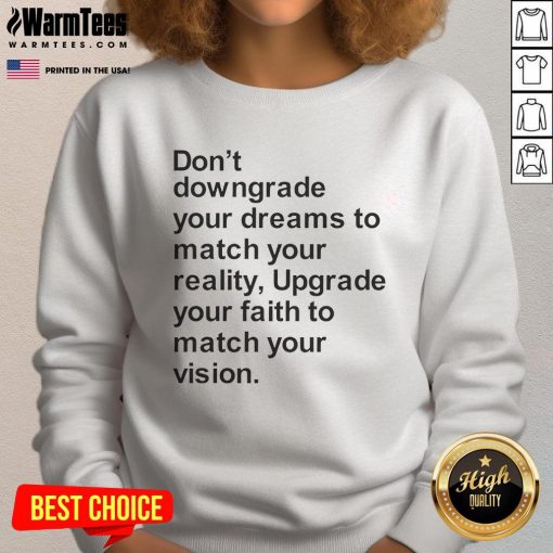 Motivational sweatshirt with 'Don't Downgrade Your Dreams to Match Your Reality' text, perfect for inspiring confidence.