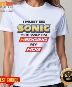 Funny ladies' tee featuring 'Good I Must Be Sonic' and playful hedgehog design, perfect for Sonic fans.