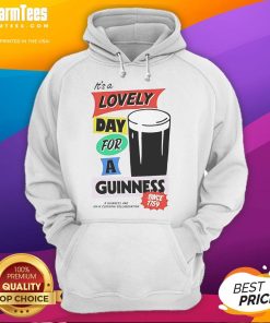 Good It's a Lovely Day for a Guinness hoodie worn outdoors, showcasing a cozy design perfect for casual wear.