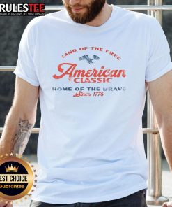 Good Land Of The Free American Classic Home Of The Brave Since 1776 T-Shirt design featuring patriotic graphics and text.