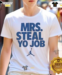 Good Lexie Hull wearing a stylish 'Mrs. Steal Yo Job' T-shirt, showcasing her unique fashion sense on the basketball court.
