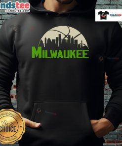Stylish 2025 Milwaukee Bucks cityscape hoodie showcasing team spirit and urban design for fans.