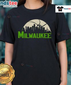 Stylish 2025 Milwaukee Bucks cityscape skyline ladies tee showcasing team spirit and urban fashion.