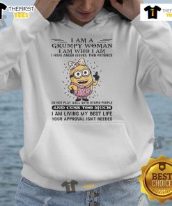Grumpy woman wearing a 'Good Minion I Am Grumpy' hoodie, showcasing a fun, playful design for Minion fans.