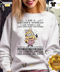 Grumpy woman wearing a 'Good Minion I Am' sweatshirt, showcasing a fun and quirky style for fans of Minions.